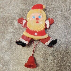 Vintage PLASTIC “JUMPING SANTA” CHRISTMAS PULL-STRING BROOCH PIN 1970s